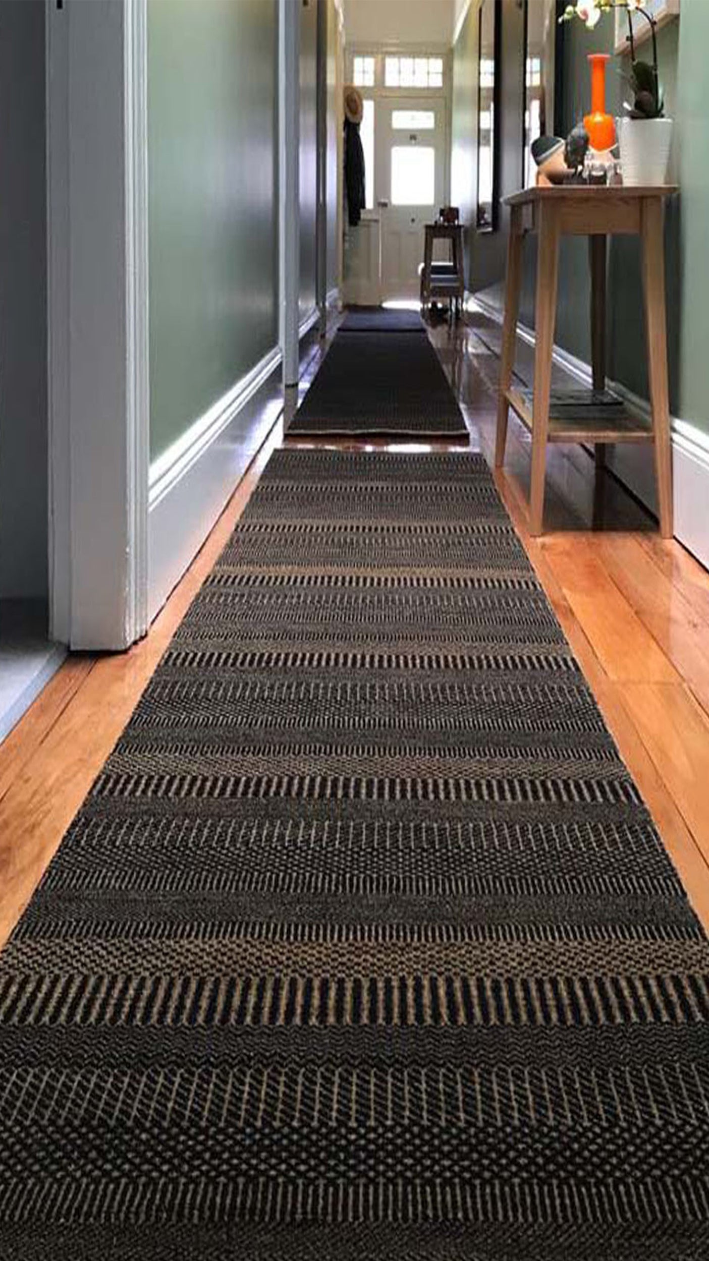 Carpet runner in hallway best sale